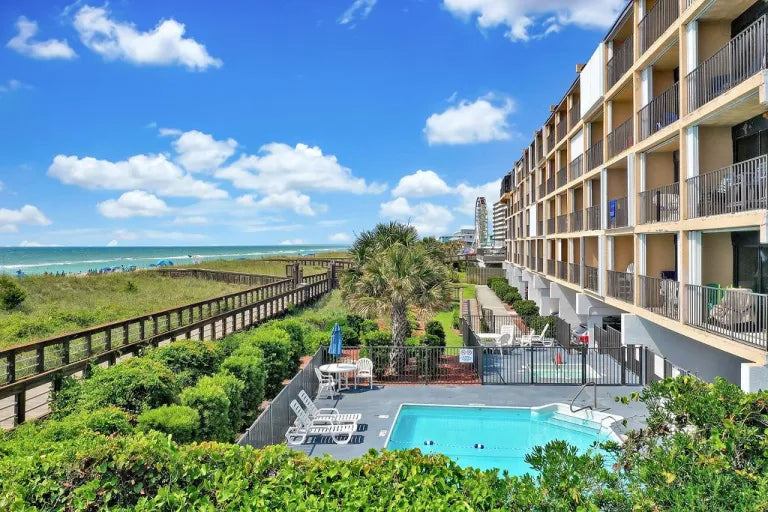 aerial view of pool associated with boardwalk bungalow rental