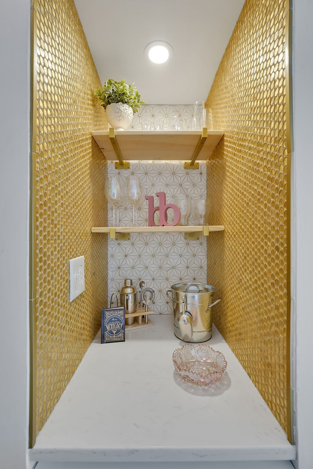 drinks corner with gold tile at boardwalk bungalow rental